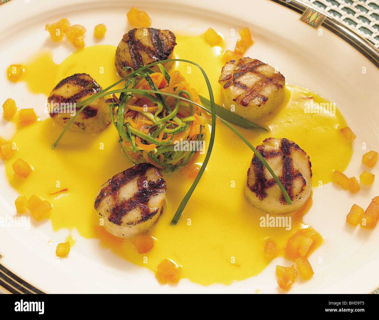 Fresh grilled scallops with vegetables, Iceland Stock Photo