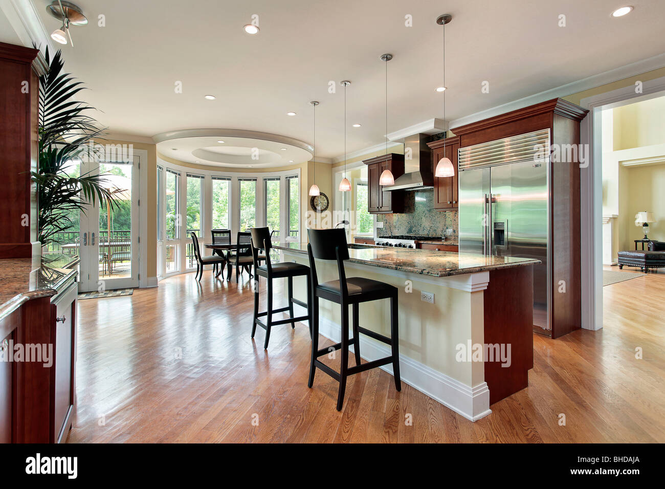 Kitchen in luxury home with curved eating area Stock Photo