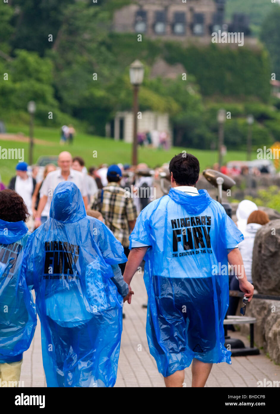 Tourists at Niagara Falls in Canada still wearing the blue raincoats