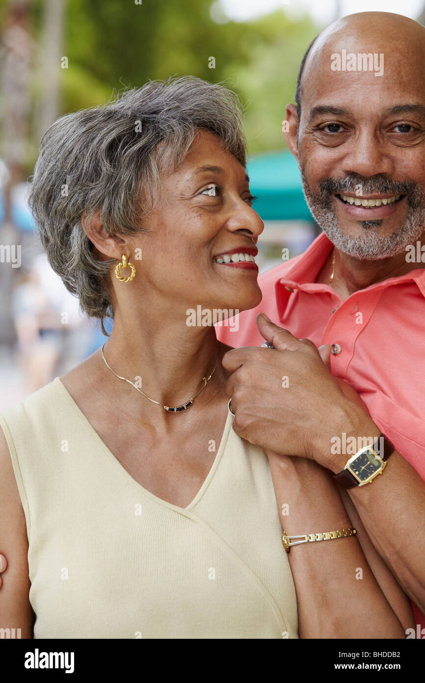 African couple holding hands Stock Photo - Alamy