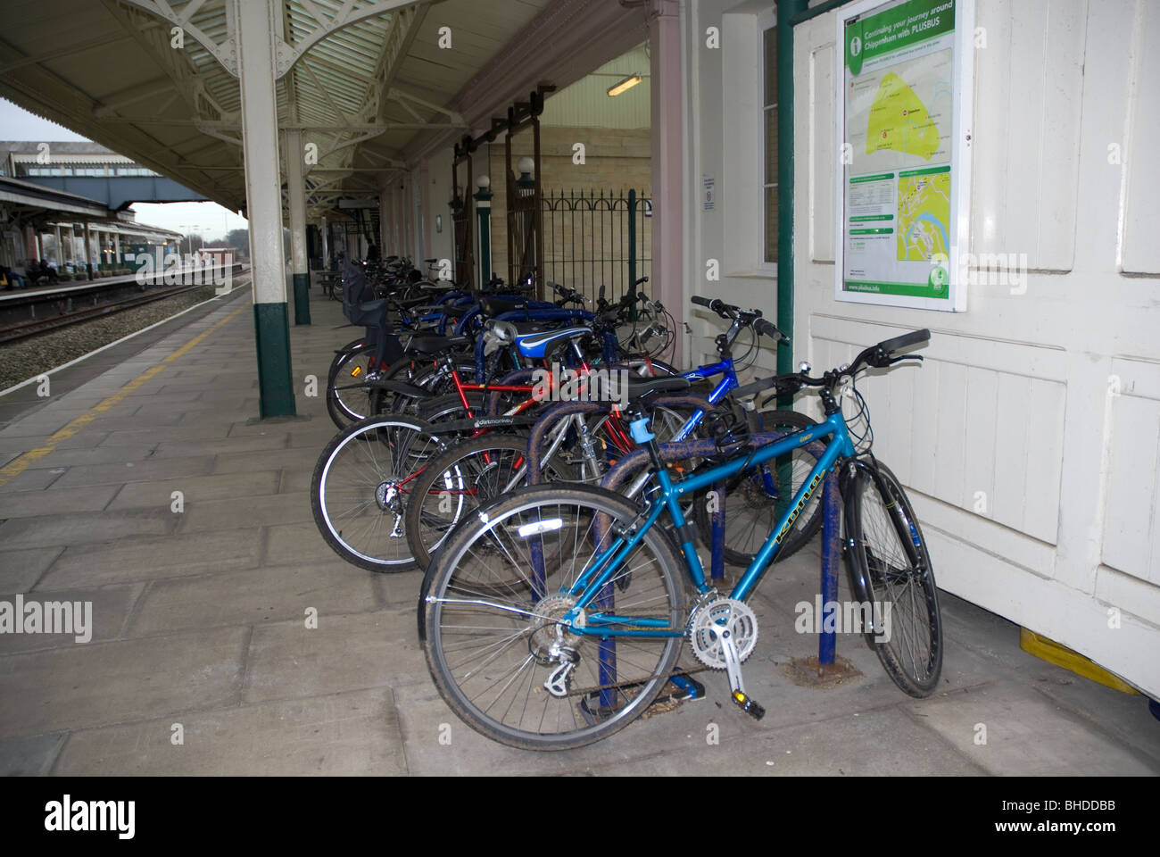 Bicycles chained to a cycle rack on the platform at Chippenham Railway Station wiltshire, UK Stock Photo