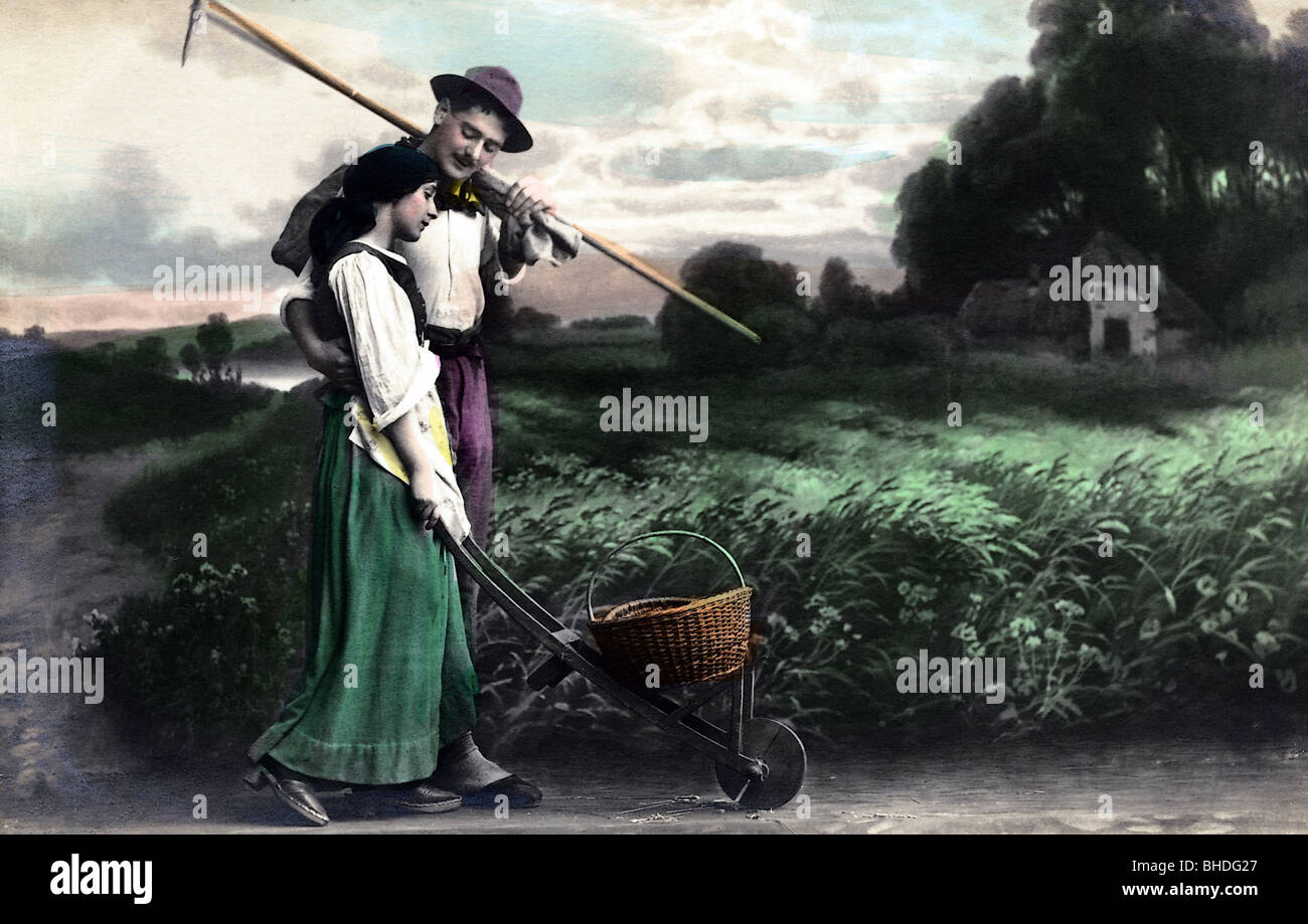 agriculture, young couple with cart going home, studio shot, coloured picture postcard, circa 1900, Stock Photo