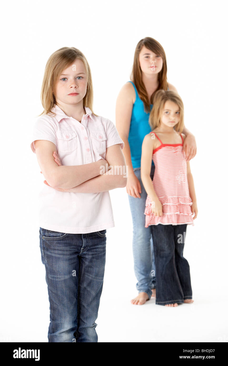 Group Of Girls Together In Studio Looking Unhappy Stock Photo