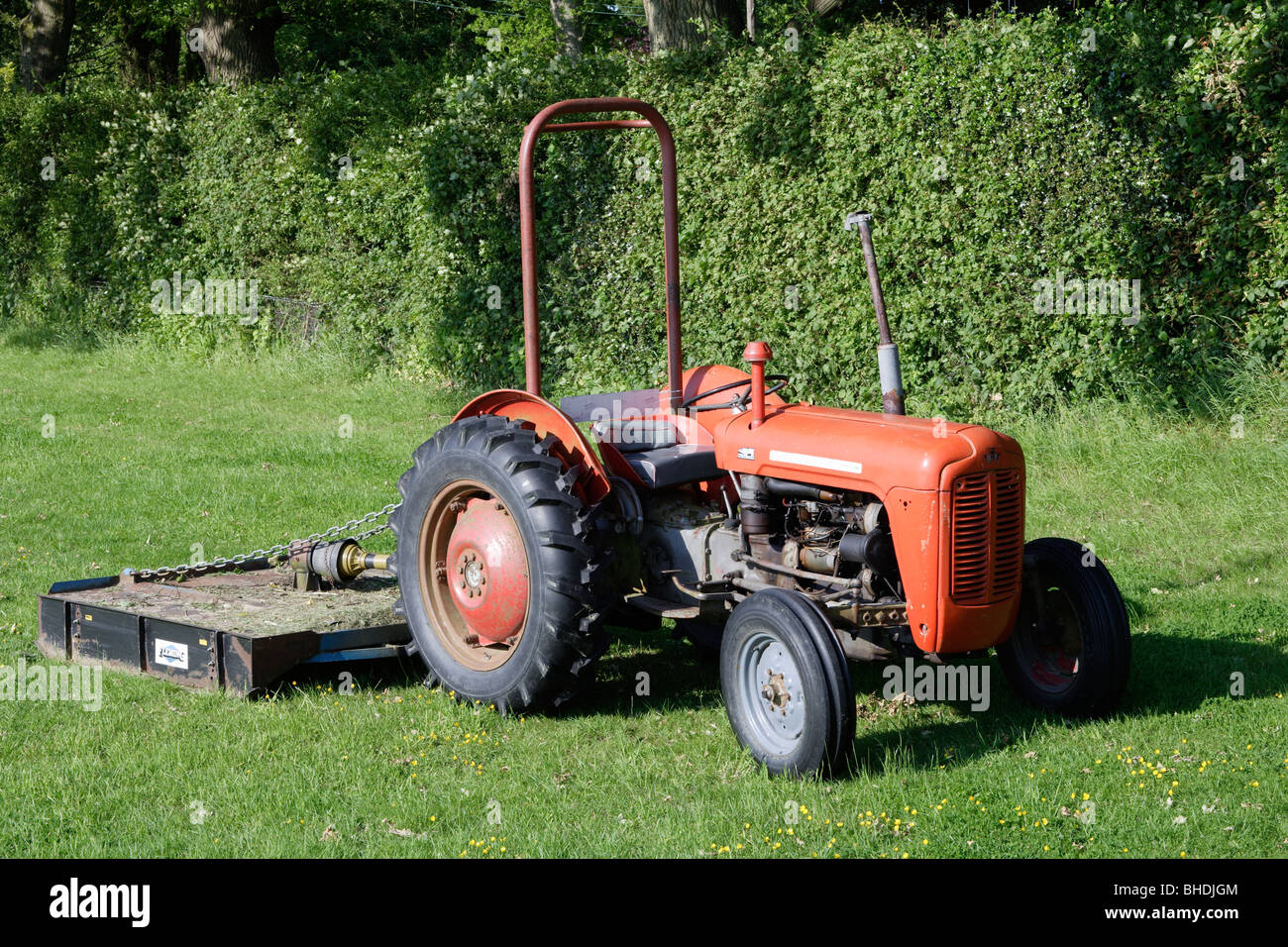 Massey Fergusson 1960's tractor with grass topper Stock Photo