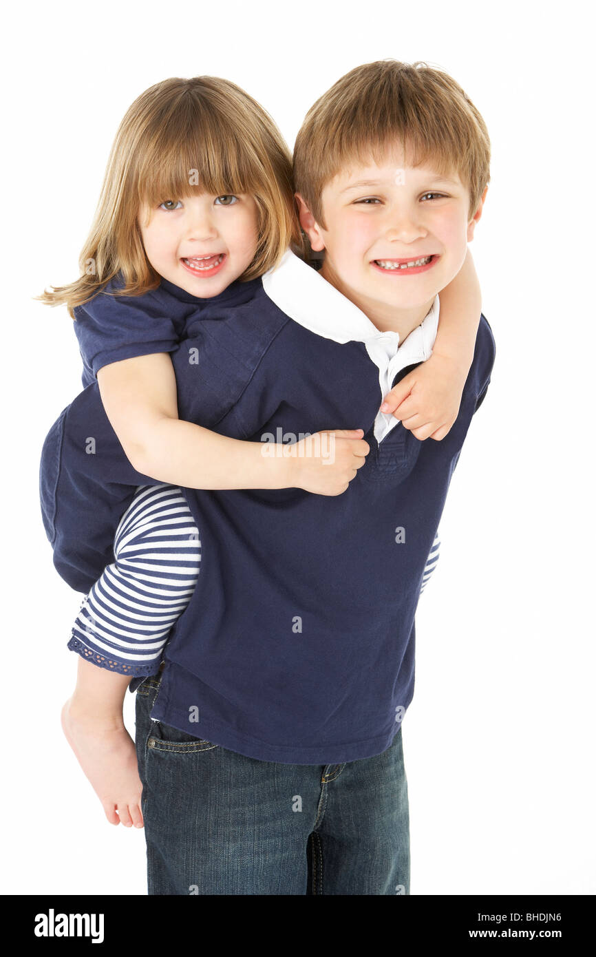 Boy Giving Piggyback Ride To Twin Sister Stock Photo - Image of game,  friend: 233593328, piggyback 