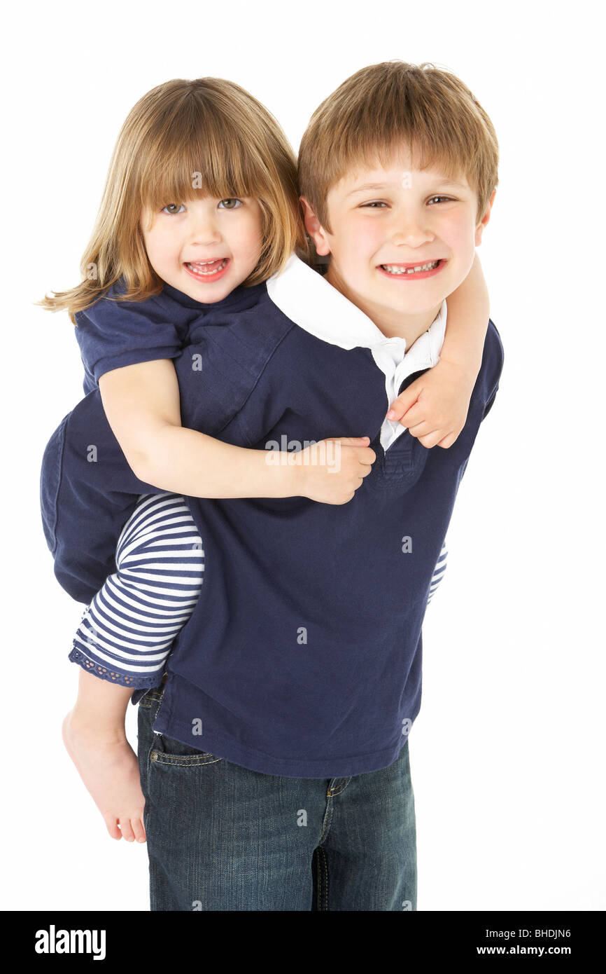 Boy Giving Piggyback Ride To Twin Sister Stock Photo - Image of game,  friend: 233593328