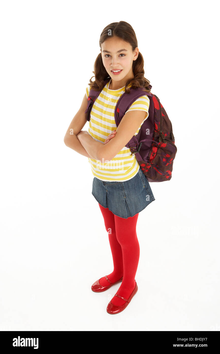 Studio Portrait Of Young Girl With Backpack Stock Photo