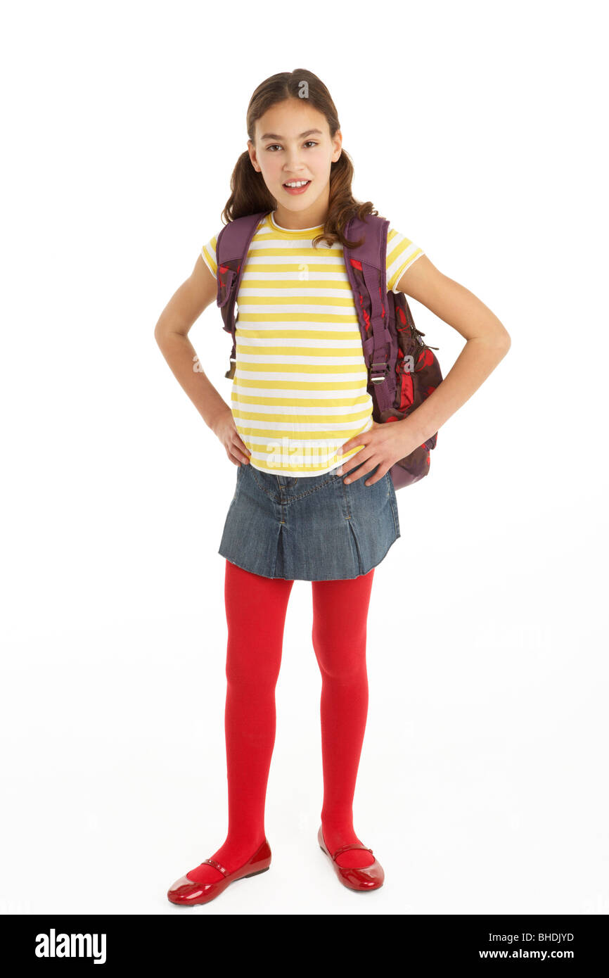 Studio Portrait Of Young Girl With Backpack Stock Photo