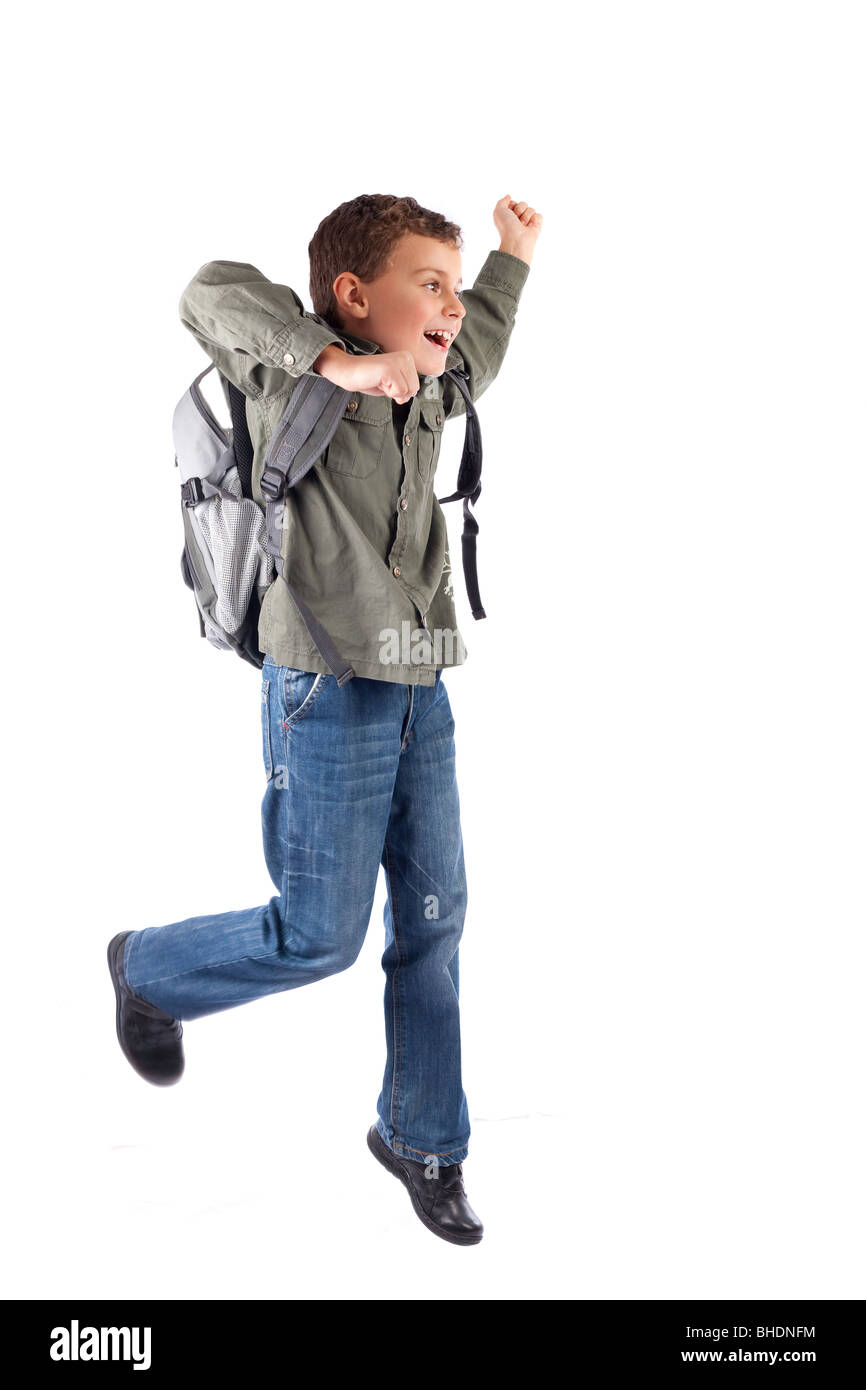 Portrait of a cute schoolboy with backpack isolated on white background ...