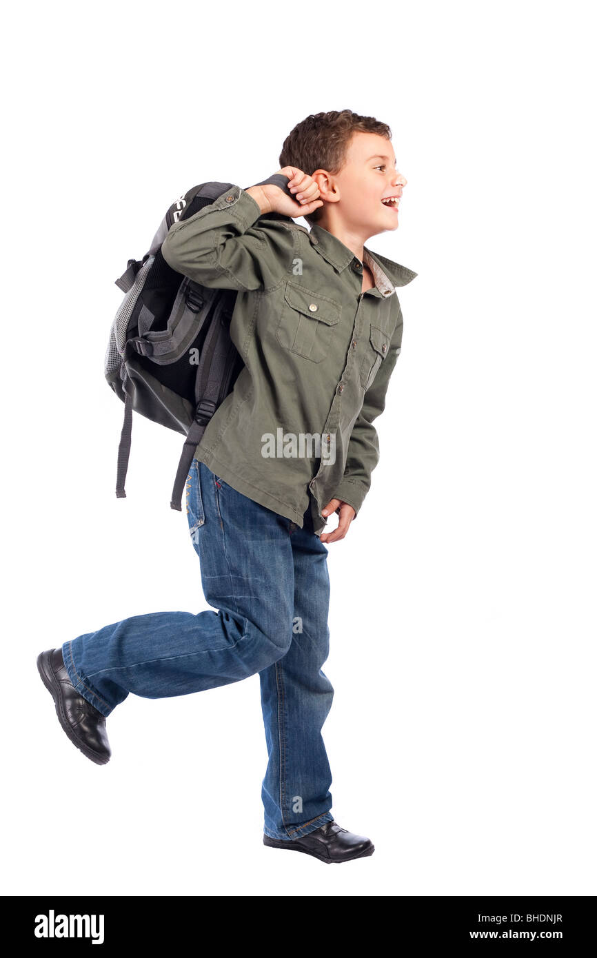 Portrait of a cute schoolboy with backpack isolated on white background ...