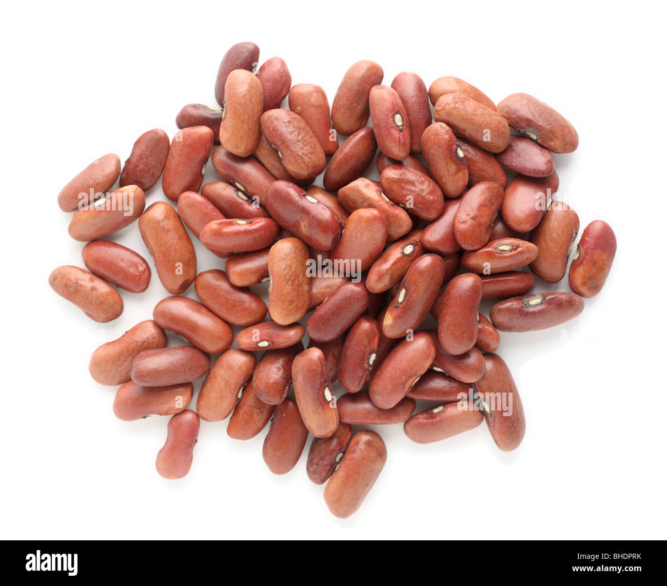 A group of red kidney beans seen from above with a light shadow on a