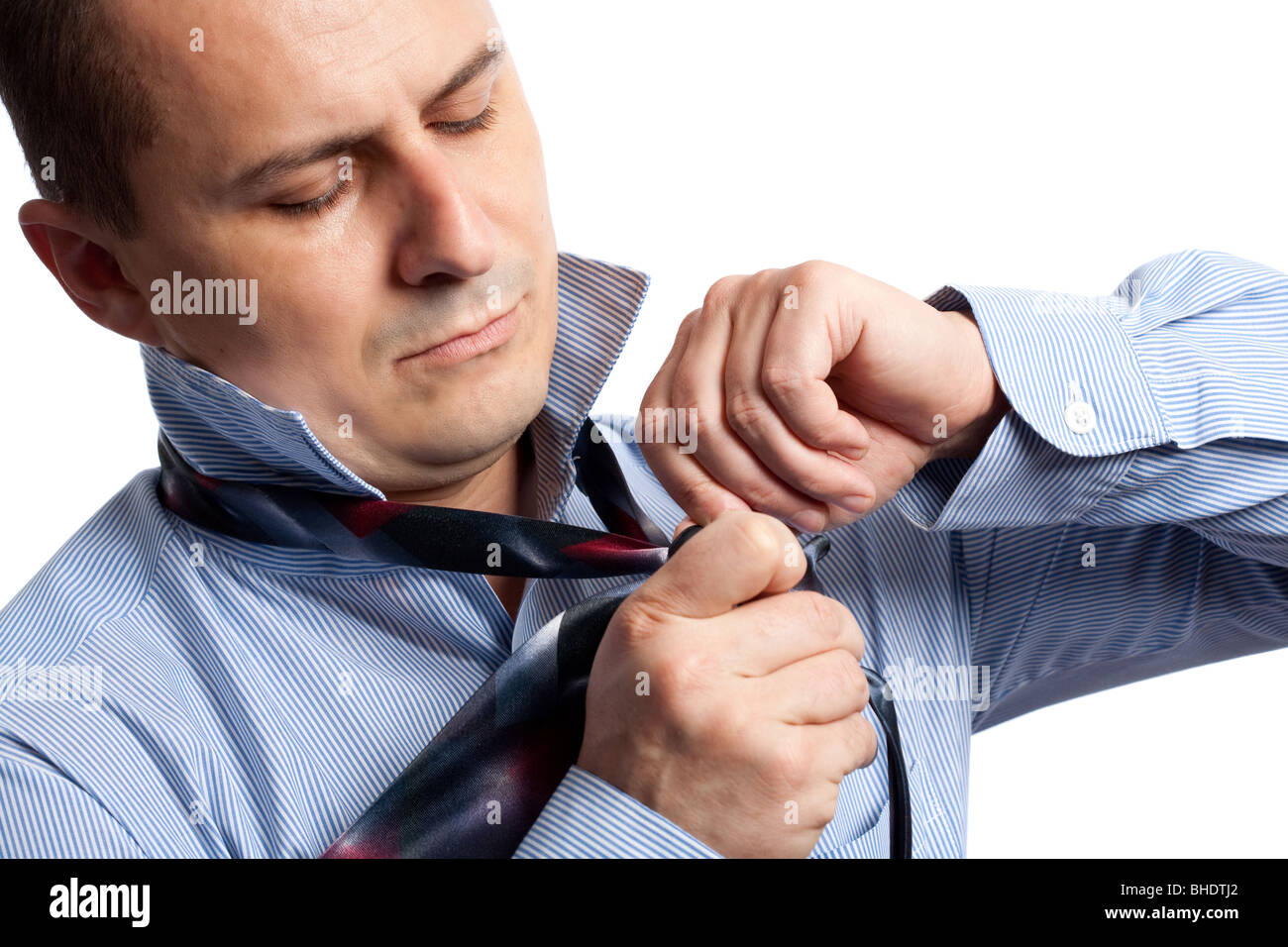 Businessman Adjusting Tie Knot Handsome Businessman Adjusting Tie Knot Isolated On White