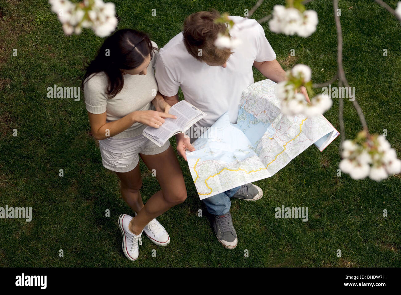 couple with map and tour guide Stock Photo