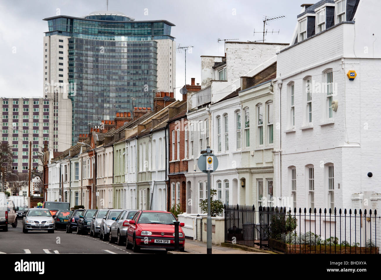 Terraced homes in Farm Lane, Fulham, London and Empress State Building