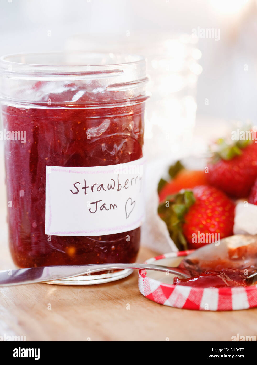 Jar of strawberry jam Stock Photo