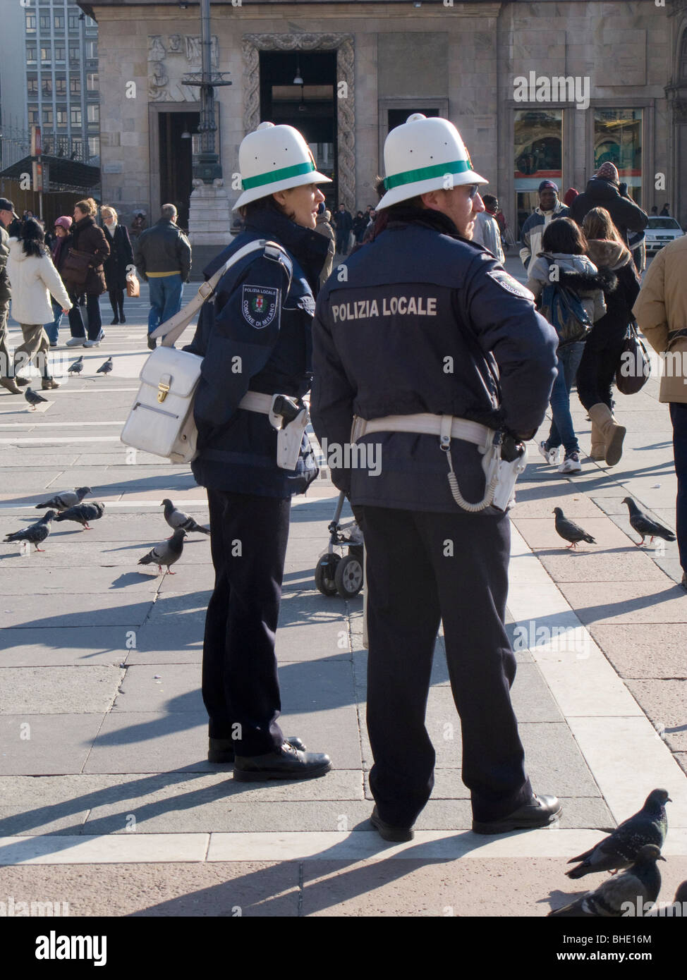traffic policeman and traffic policewoman, piazza del duomo, milan, lombardia, italy Stock Photo