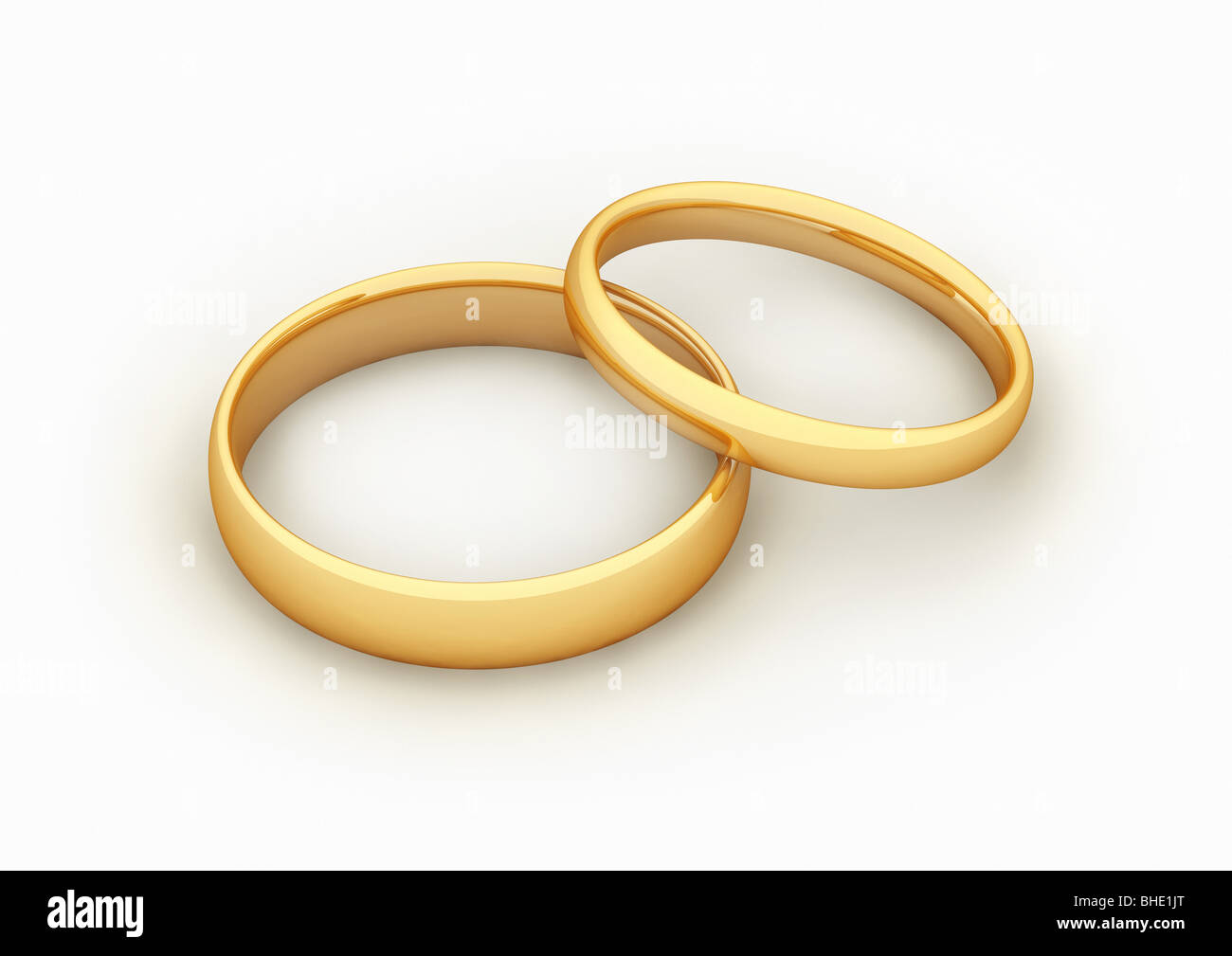 2 golden rings, symbol for marriage / fusion - 2 goldene Ringe, Symbol für  Fusion / Heirat Stock Photo - Alamy