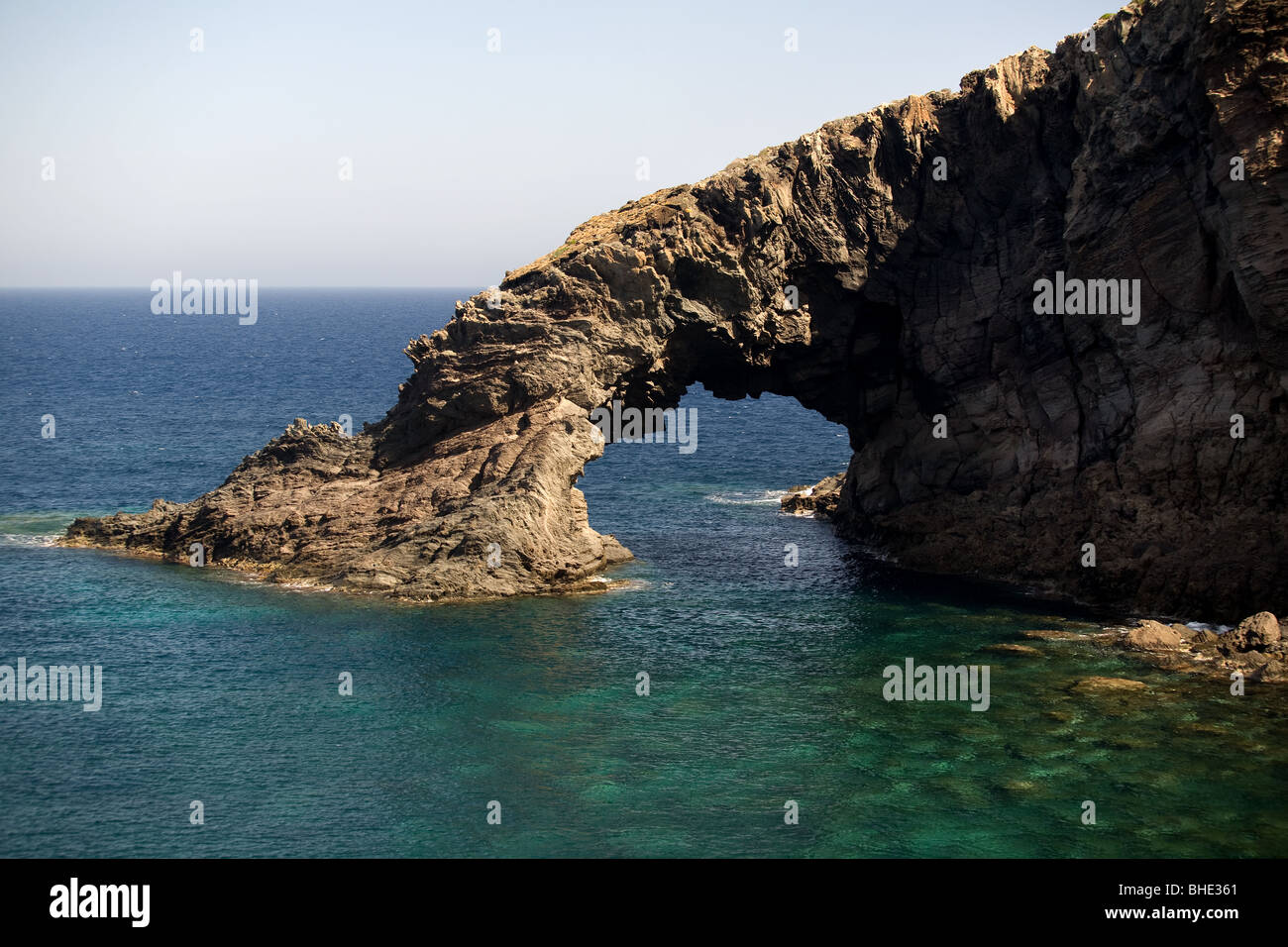 Italy, Sicily, Pantelleria Island, sea, volcanic rock formation called Elephant Arch Stock Photo