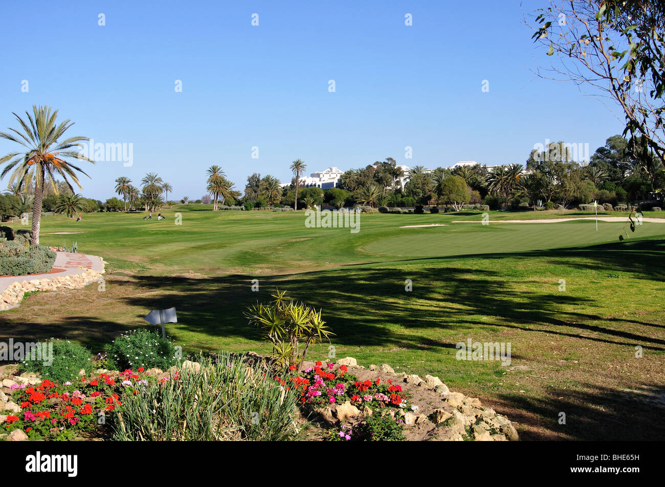 Golfers on El Kantaoui Golf Course fairway, Port El Kantaoui, Sousse  Governorate, Tunisia Stock Photo - Alamy