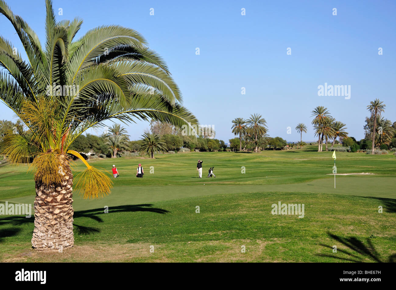 Golfers on El Kantaoui Golf Course fairway, Port El Kantaoui, Sousse  Governorate, Tunisia Stock Photo - Alamy