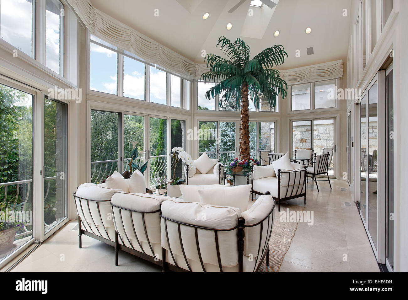 Porch in luxury home with wall of windows Stock Photo