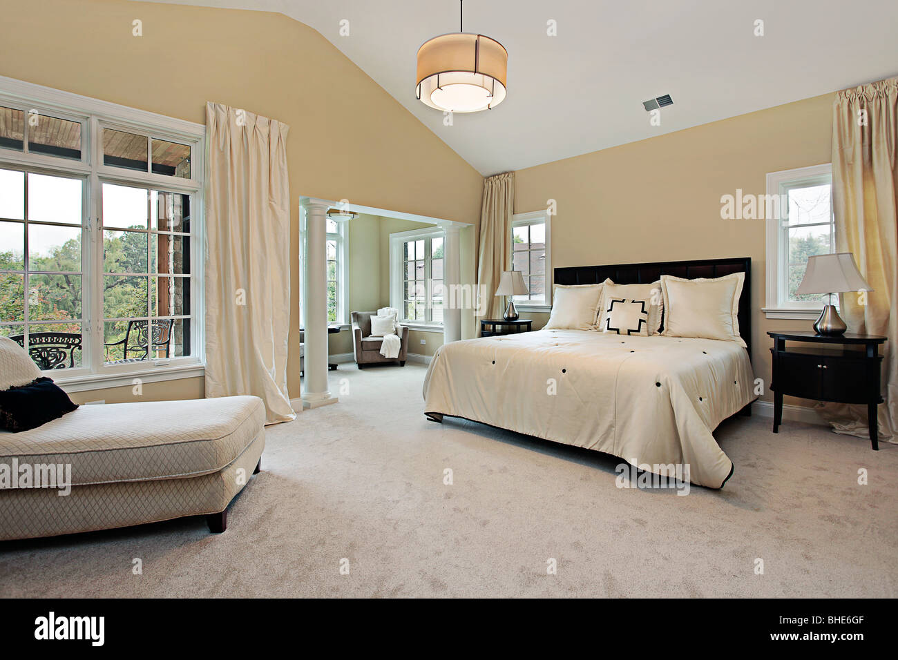 Master Bedroom In Luxury Condominium With Sitting Room Stock