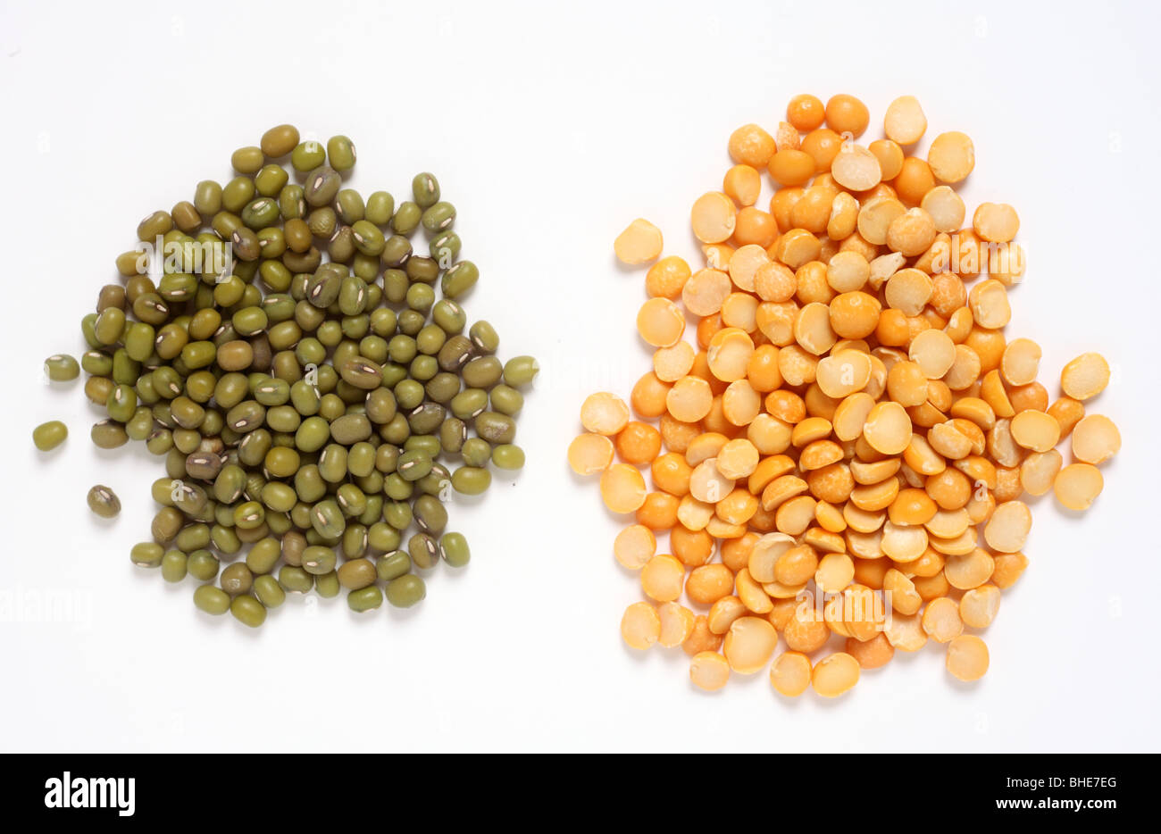 Piles of mung beans (left) and split peas, two common ingredients for