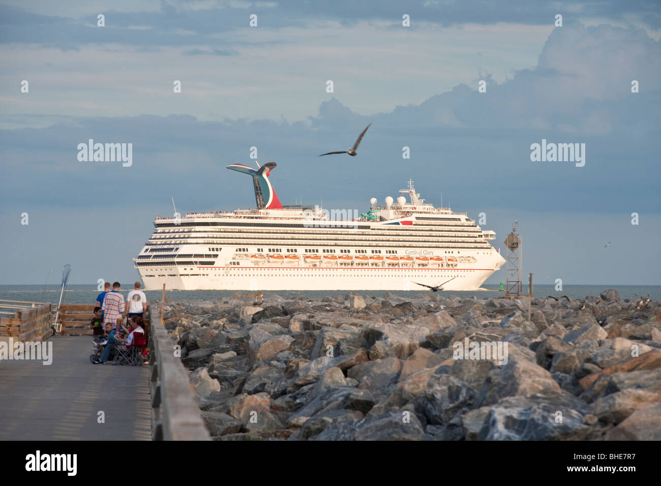 Carnival Glory cruise ship leaving Port Canaveral channel at Jetty Park in Cape Canaveral, Florida Stock Photo