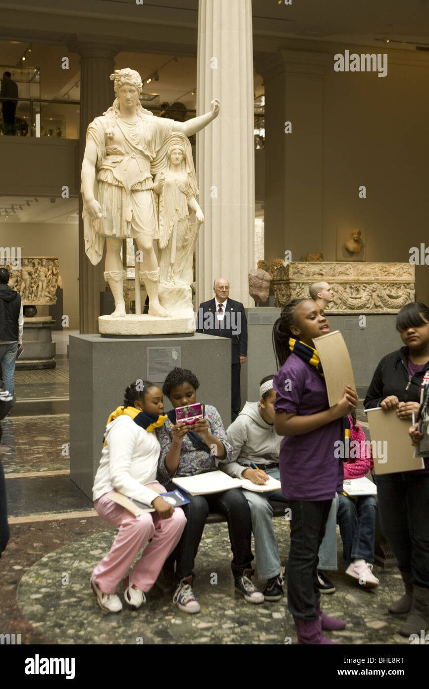 Junior high school students study art at the Metropolitan Museum of Art