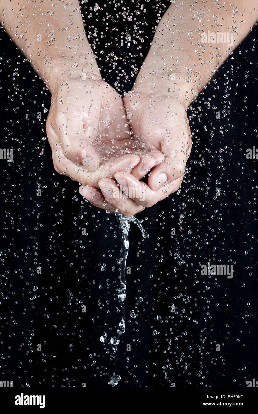 Water In Palms Of Hands Stock Photo Alamy