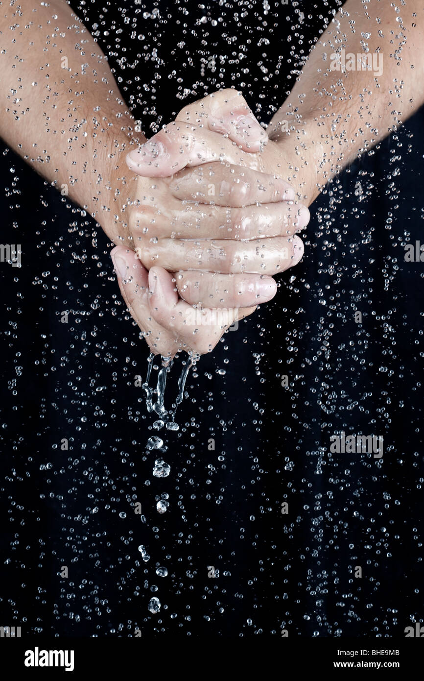 Water in palms of hands Stock Photo - Alamy