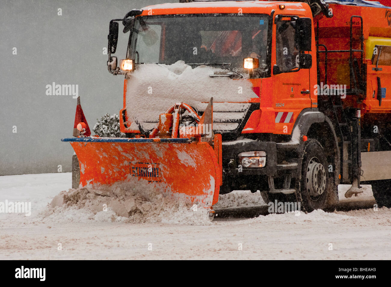 Big Snow plough in a snow storm Stock Photo