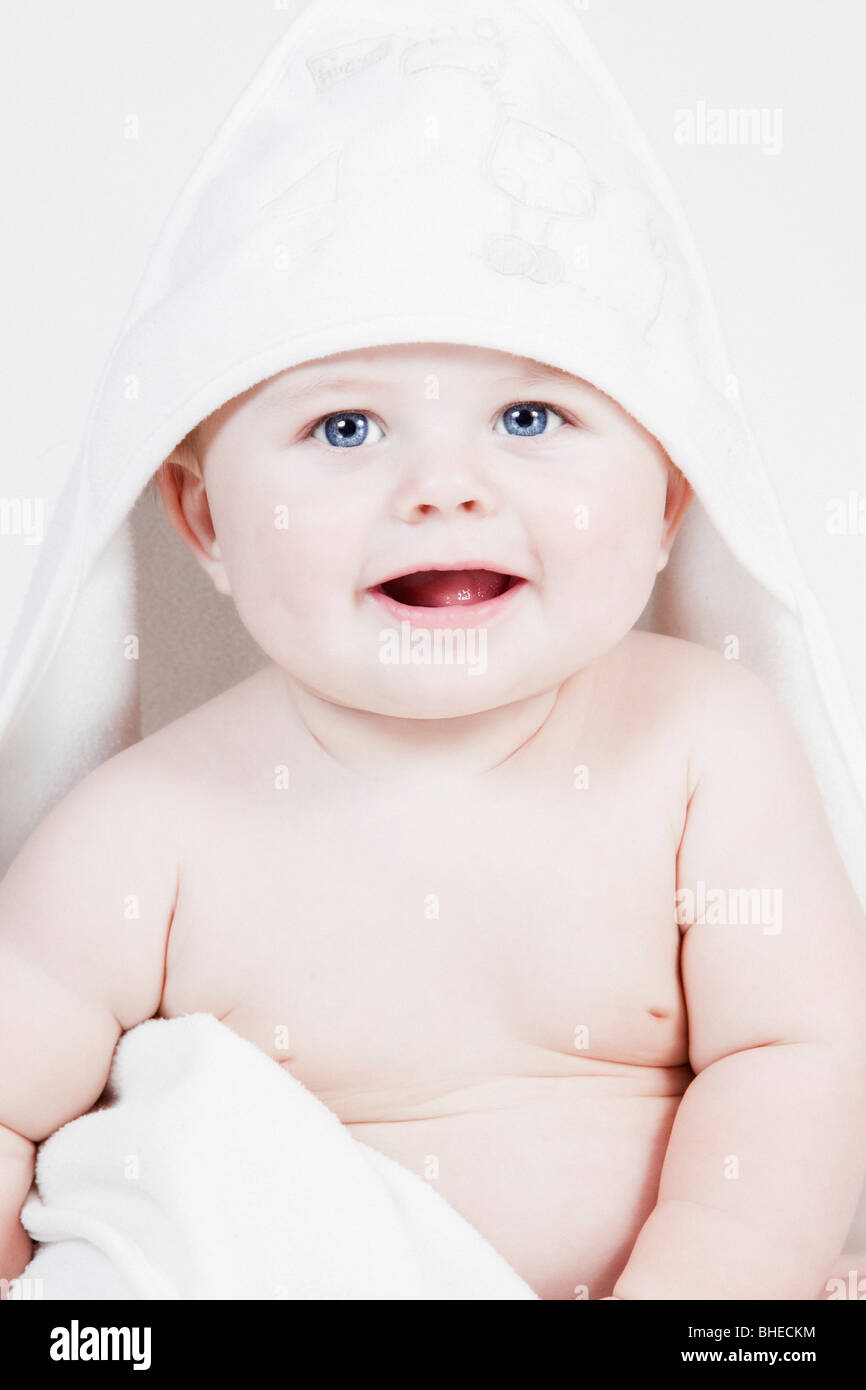 A colour color photograph of a white Caucasian male baby aged seven ...