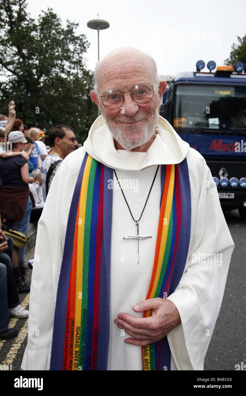 Rainbow stole and cross on a priest at Brighton and Hove Gay Pride