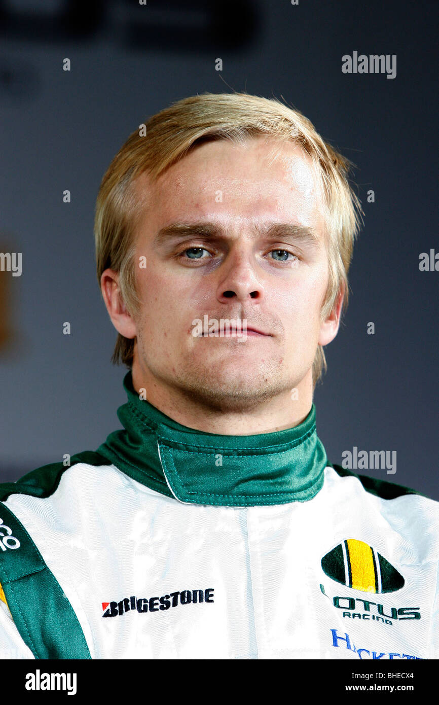 Finnish driver Heikki Kovalainen at Lotus Cosworth T127 Formula 1 car at team launch in London