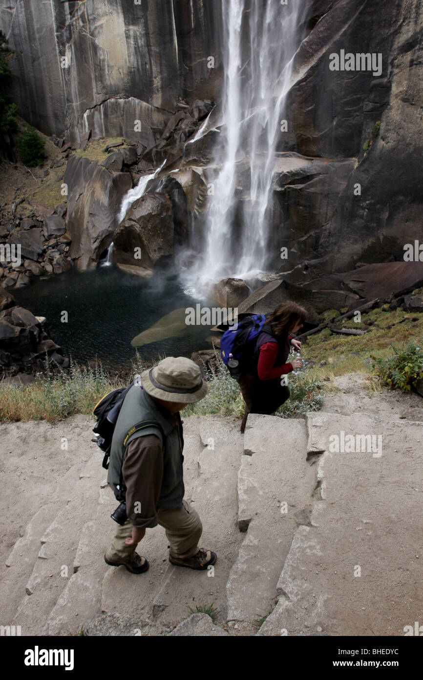 Hiker Vernal Falls trail Yosemite National Park waterfall Stock Photo