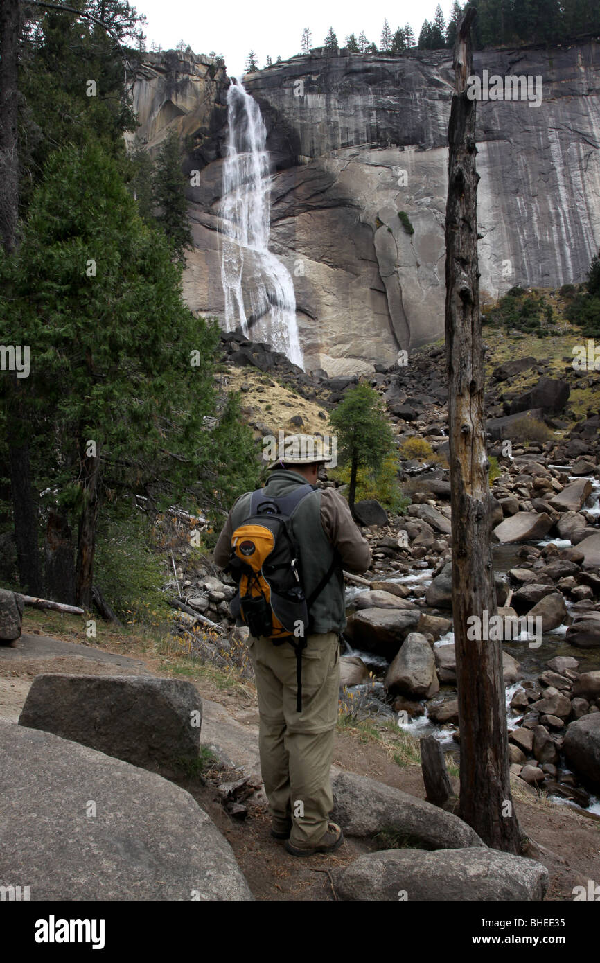 Hiker Nevada Falls trail Yosemite National Park waterfall Stock Photo
