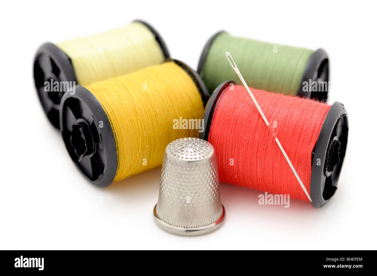 Spools of Thread and Needle, Thimble Stock Photo