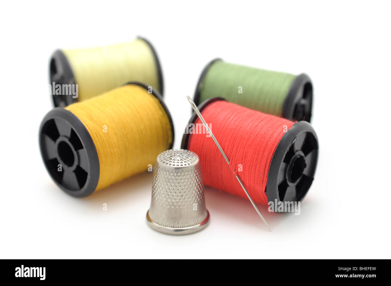 Spools of Thread and Needle, Thimble Stock Photo
