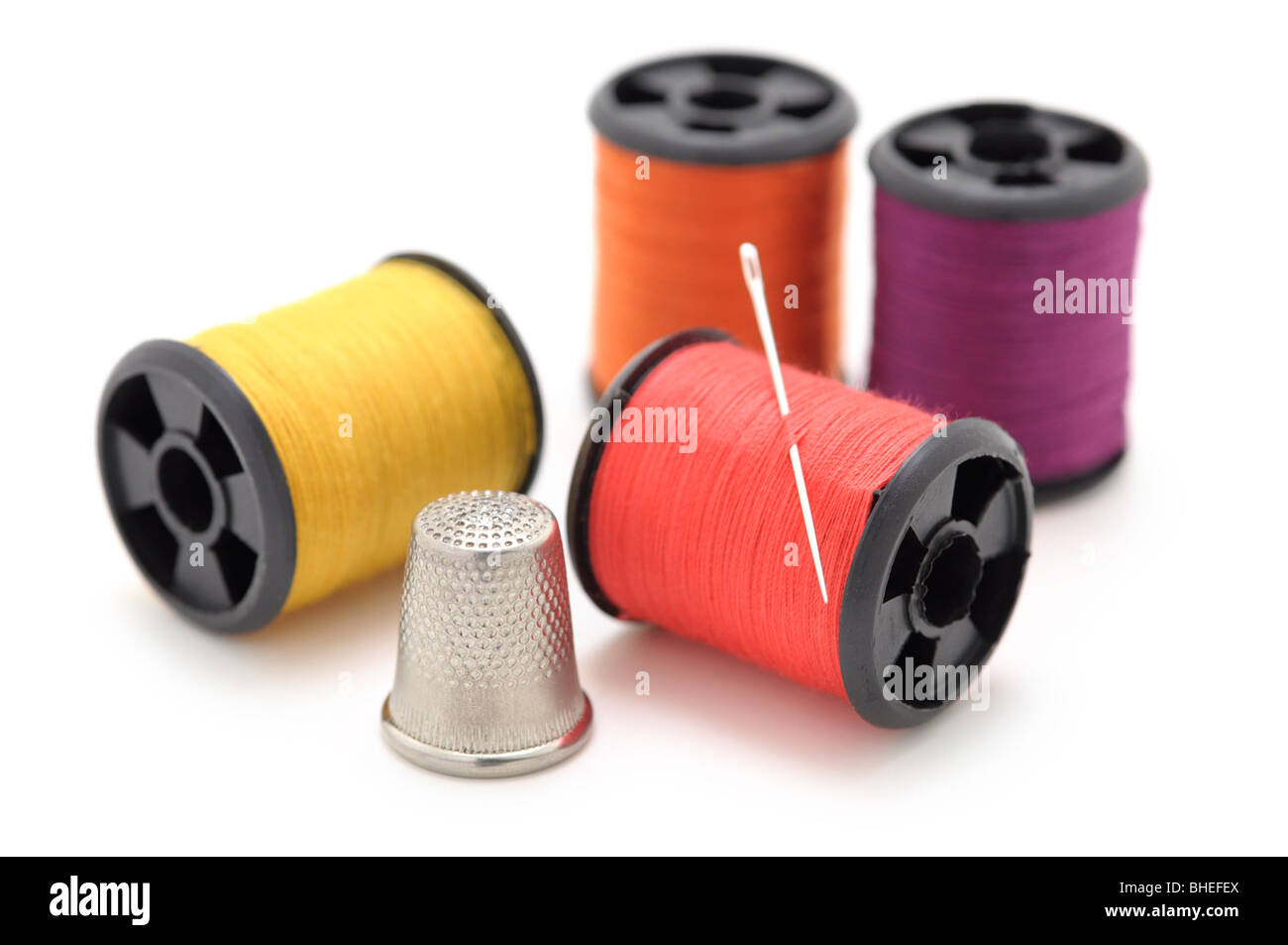 Spools of Thread and Needle, Thimble Stock Photo