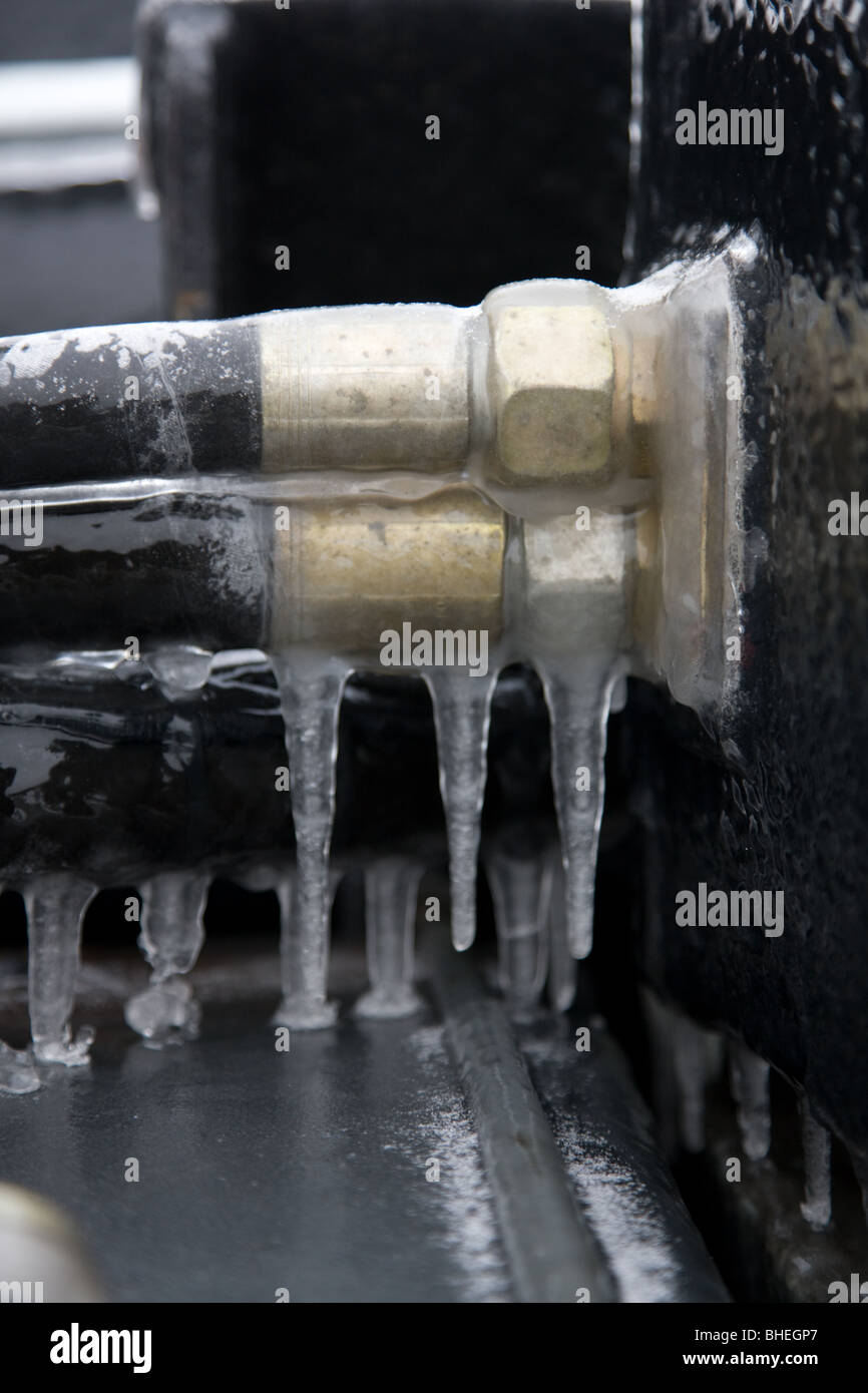 hydraulic hoses covered with ice on a truck Stock Photo Alamy