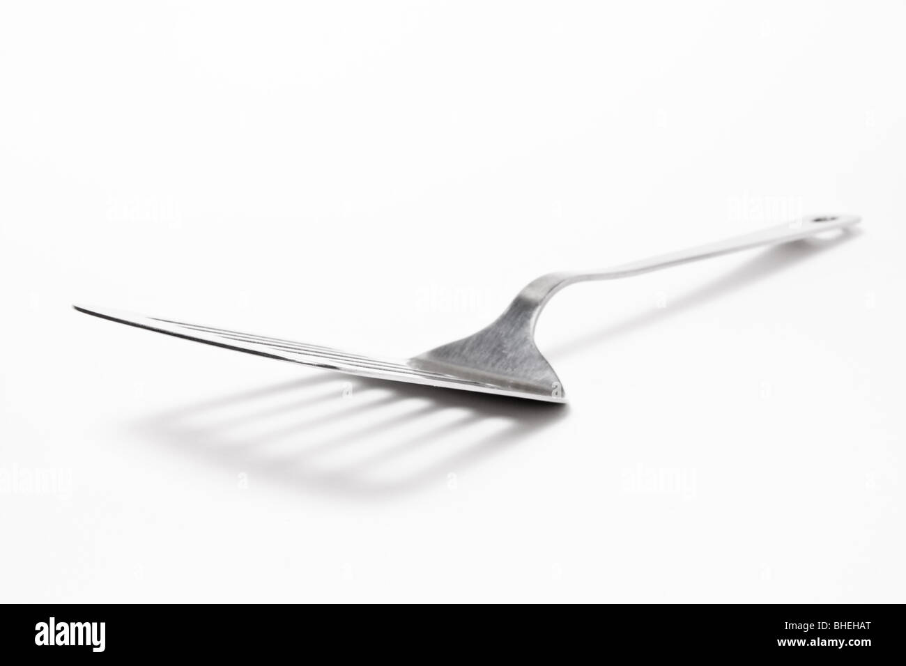 Large Stainless steel Kitchen spatula isolated against white background