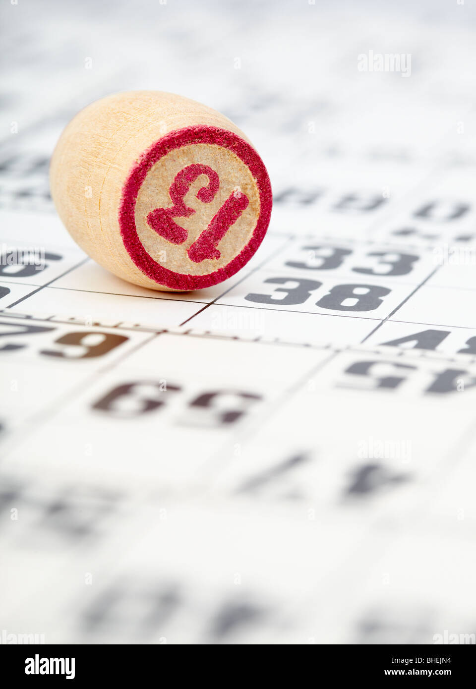 The chip with the number thirteen on the background of the cards Stock Photo