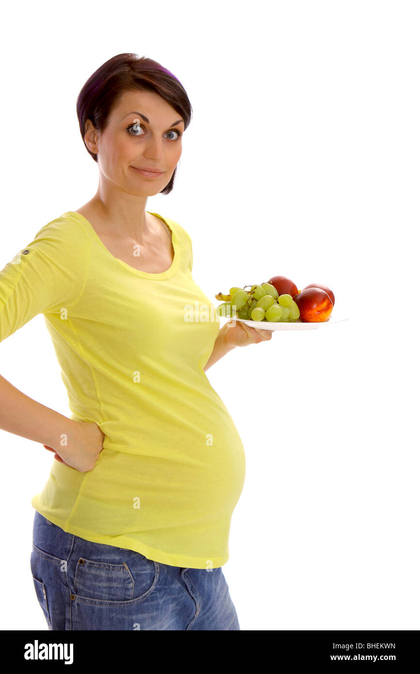 Pregnant woman with fresh fruits Stock Photo - Alamy