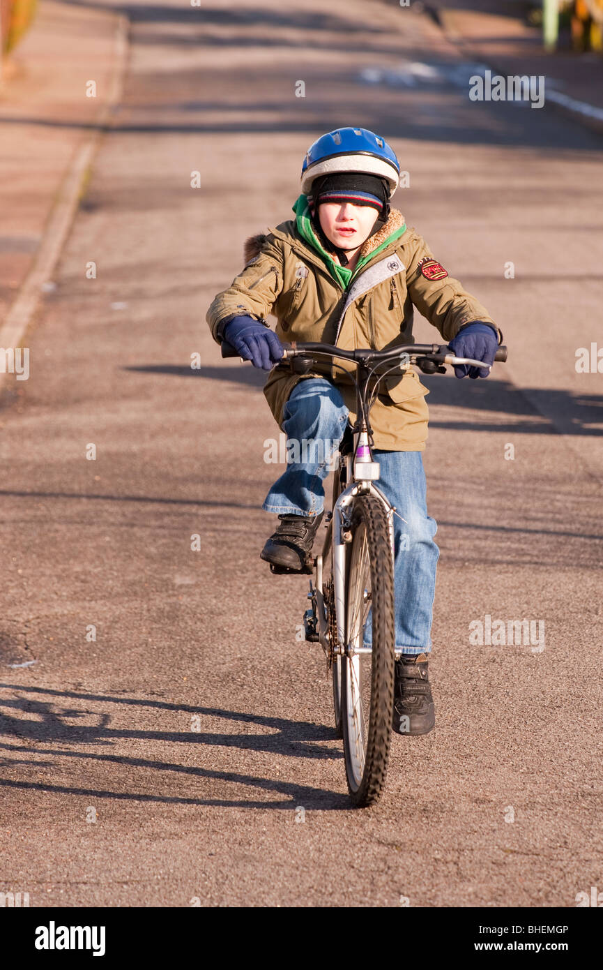 A MODEL RELEASED picture of a ten year old boy on his bike in the Uk Stock Photo Alamy
