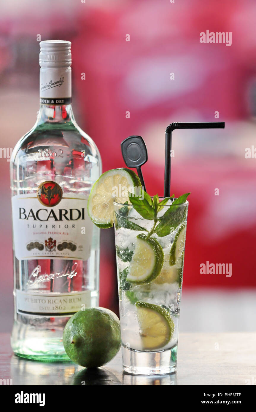 Bacardi Rum Cocktail with slices of lime in a highball glass Stock Photo -  Alamy