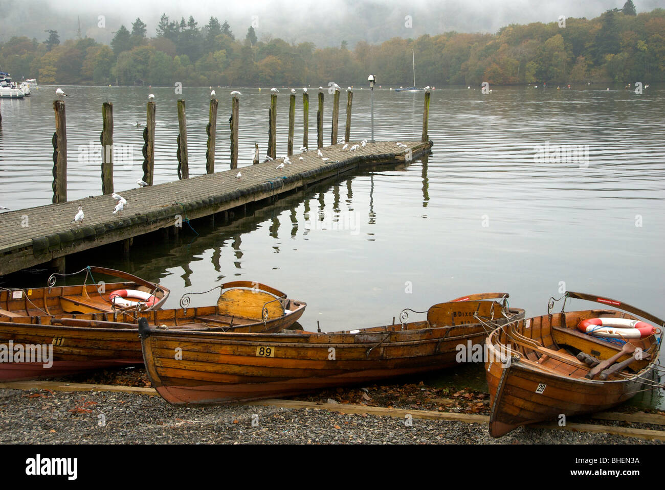 BownessonWindermere Cumbria UK Lake Boats Fog Wooden Hire Rowing Boats Jetty Stock Photo Alamy