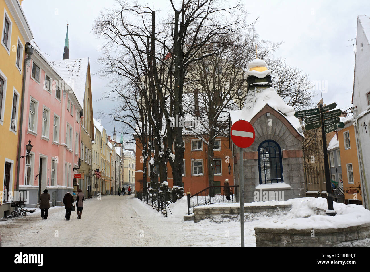 Colourful buildings and snow covered Pikk street in the Old Town, Tallinn, Estonia. Stock Photo