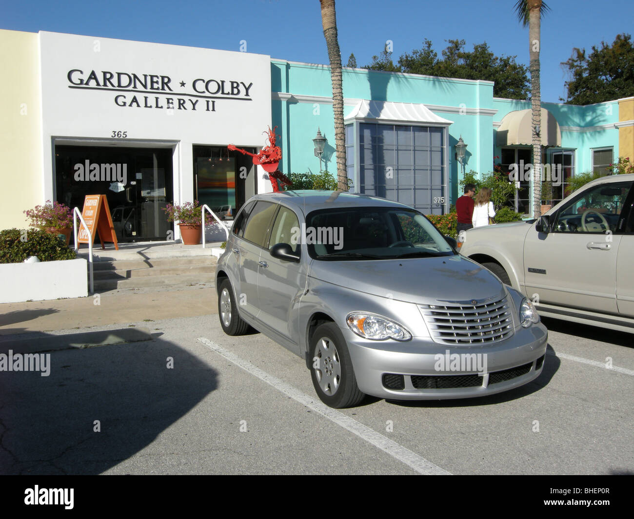 2009  Chrysler Cruiser in front of the Gardner Colby Gallery in the historic district of Naples Florida USA Stock Photo
