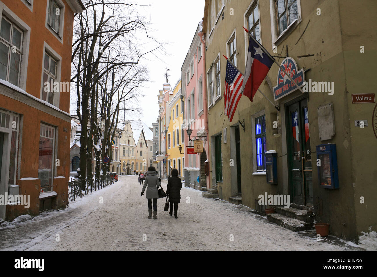 Colourful buildings and snow covered Pikk street in the Old Town, Tallinn, Estonia. Stock Photo